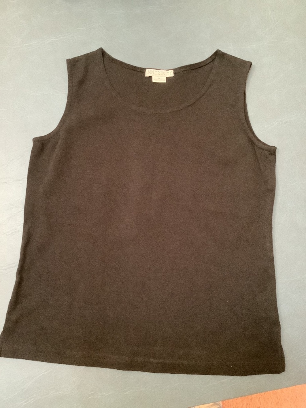 Ann Trinity jet black sleeveless top. Size medium